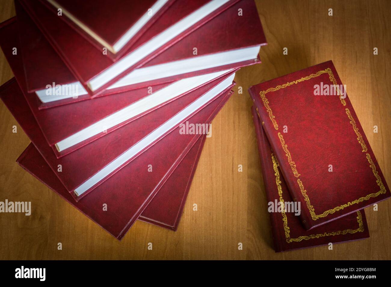 classical literature books stack. Same dust jacket Stock Photo Alamy