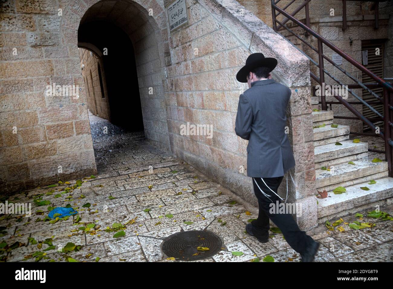 Hurva Square Jewish man walking in the downtown of Jerusalem city at Hurva square ...