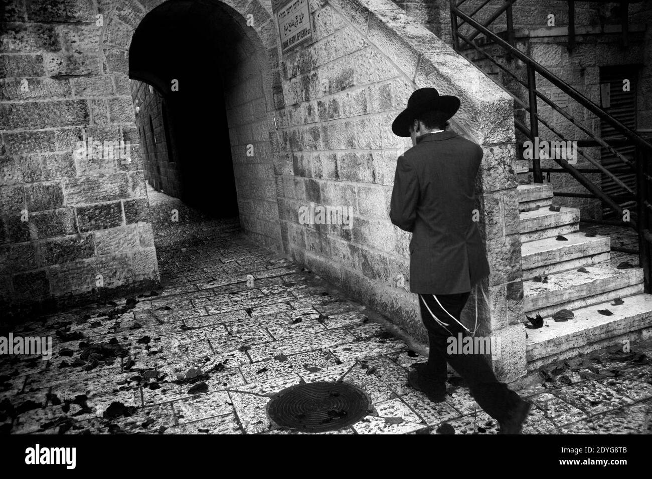 Hurva Square Jewish man walking in the downtown of Jerusalem city at Hurva square ...