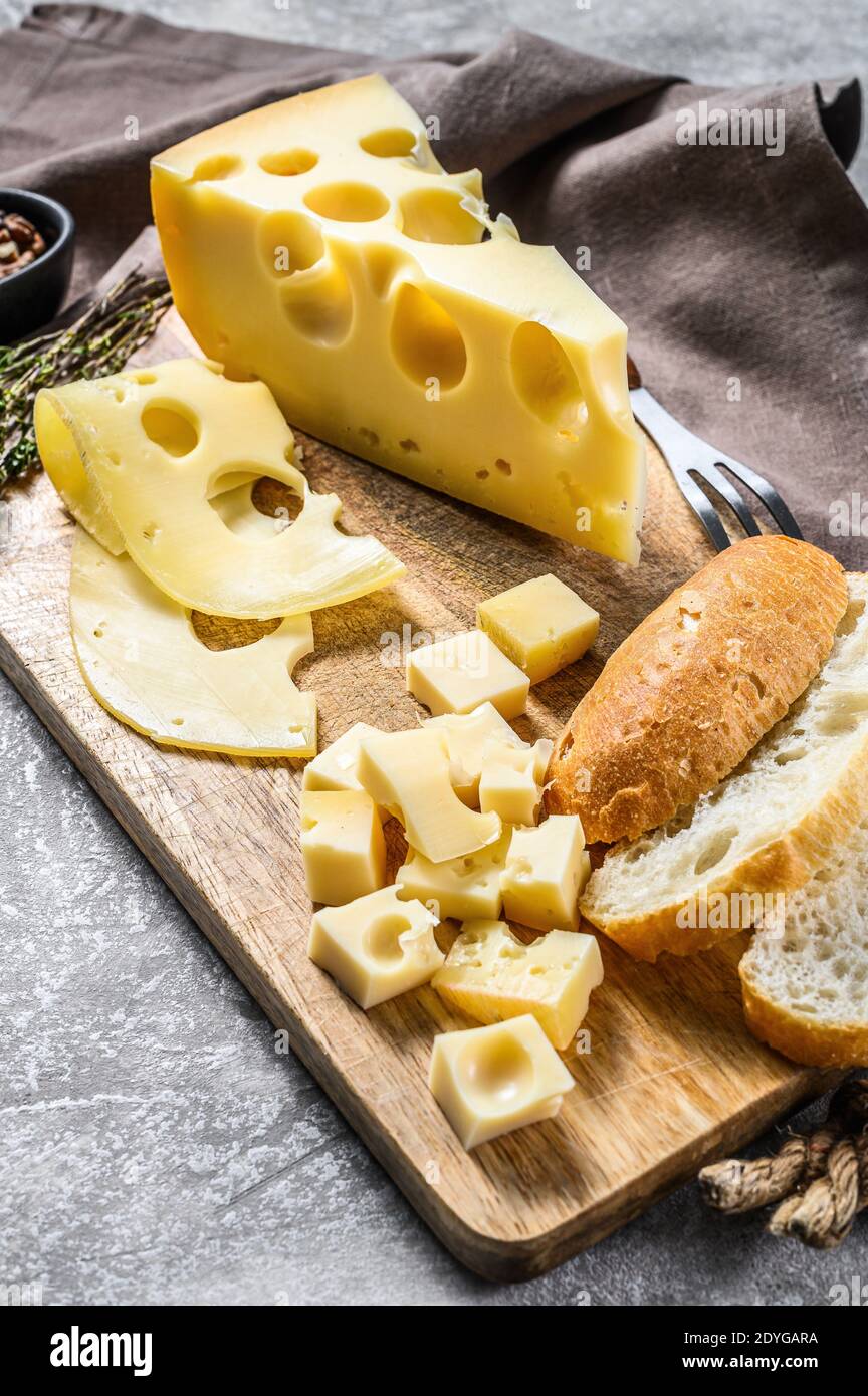 Maasdam Cheese With Walnut And Thyme Gray Background Top View Stock Photo Alamy