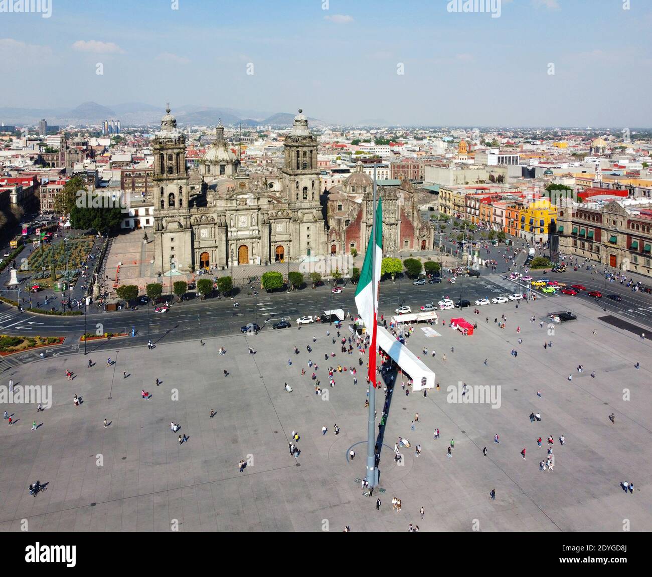 Mexico National Flag on Zocalo Constitution Square and Metropolitan Cathedral aerial view, Mexico City CDMX, Mexico. Historic center of Mexico City is Stock Photo