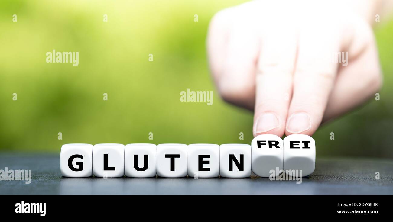 Dice form the German expression 'gluten frei' (gluten free). Stock Photo