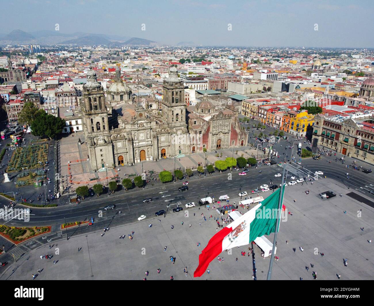 Mexico National Flag on Zocalo Constitution Square and Metropolitan Cathedral aerial view, Mexico City CDMX, Mexico. Historic center of Mexico City is Stock Photo