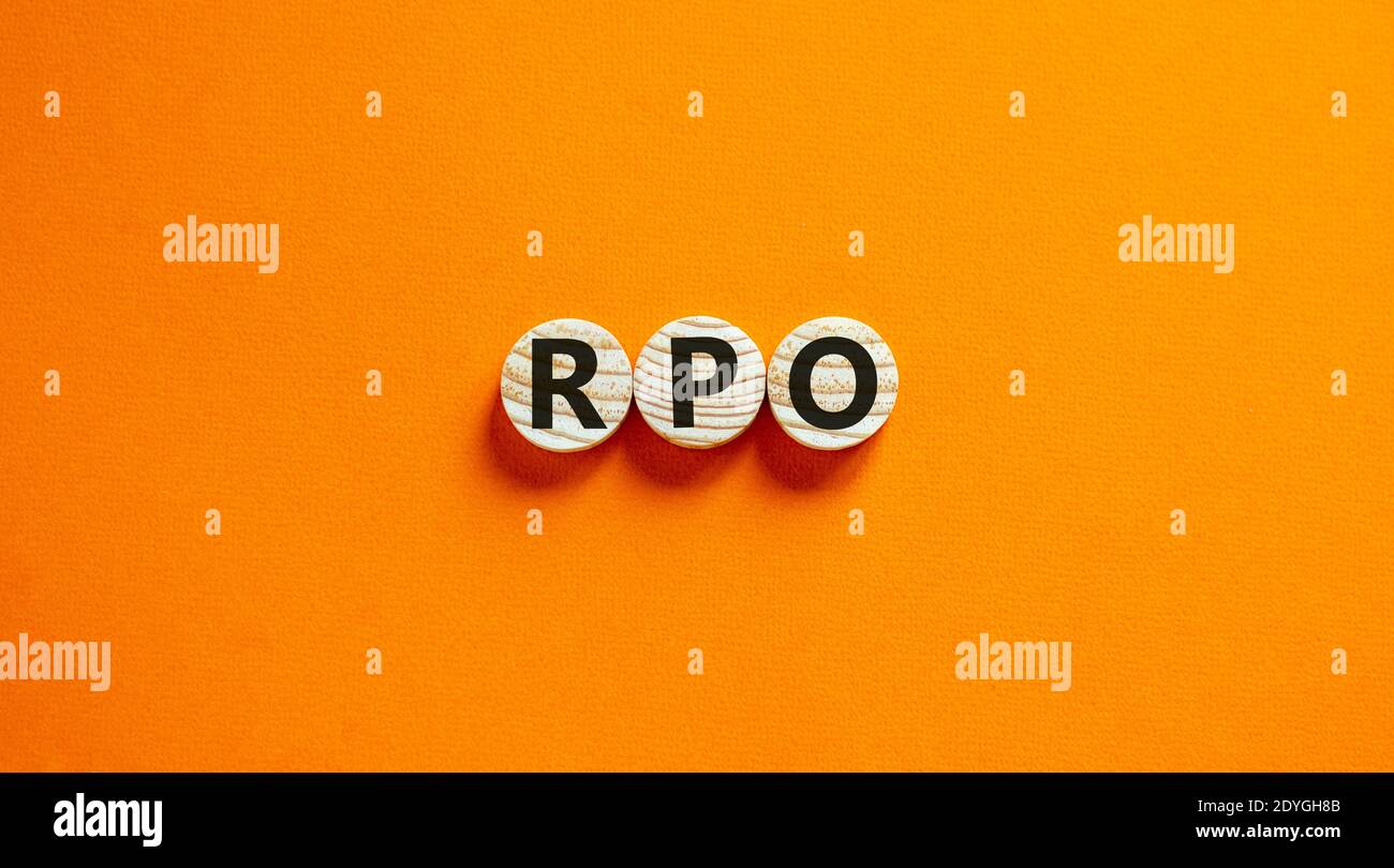 RPO symbol. Wooden circles with word 'RPO - recruitment process ...