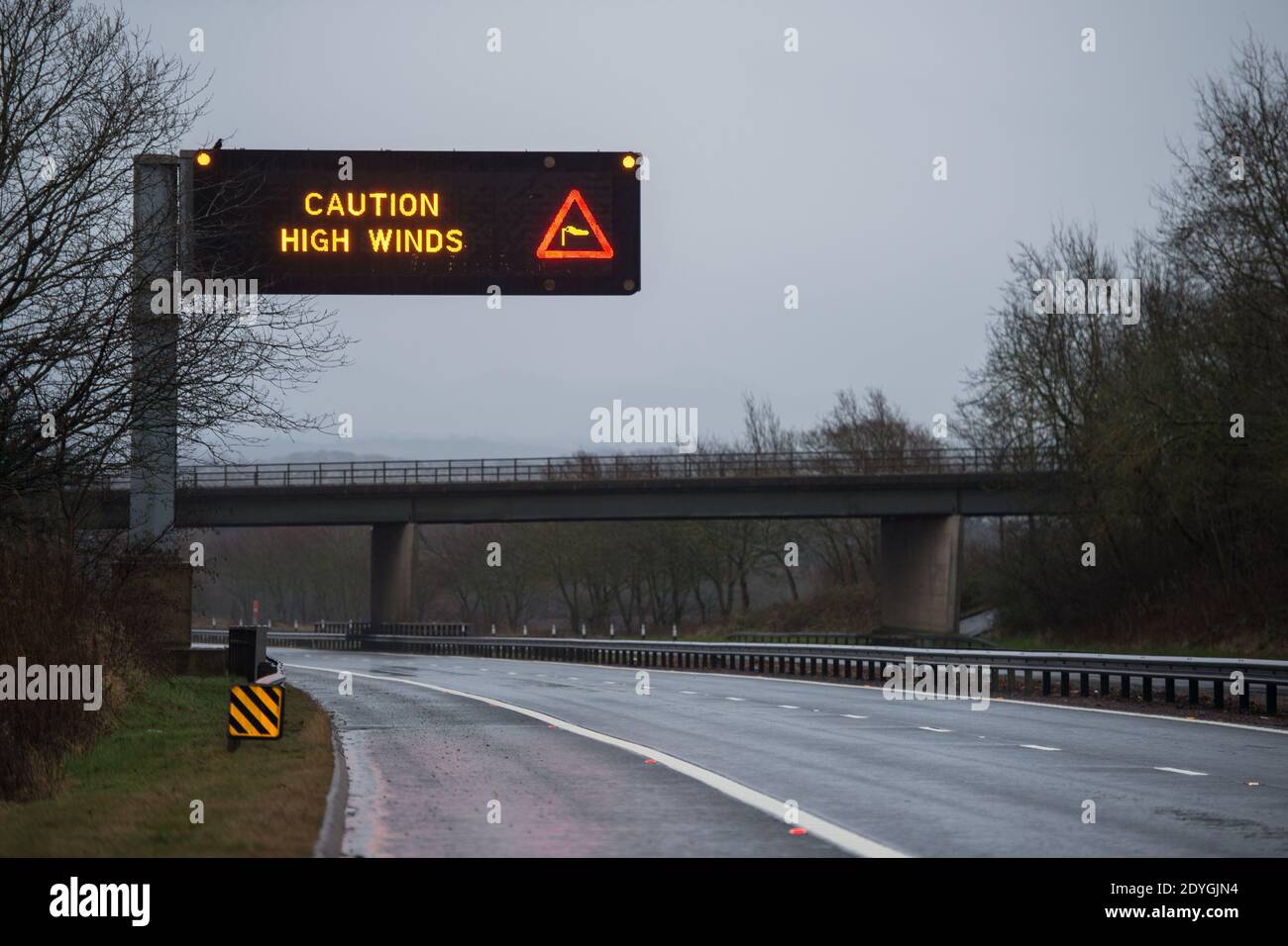 Edinburgh and Central Scotland, Scotland, UK. 26th Dec, 2020. Pictured: Motorway road signs advising high winds, and extreme weather, with MET Office issuing a Yellow ‘risk to life' weather alert. Forecasters have predicted up to 80mph winds and potentially more than three inches of rain in parts of the UK as Storm Bella crashes into Britain. Credit: Colin Fisher/Alamy Live News Stock Photo