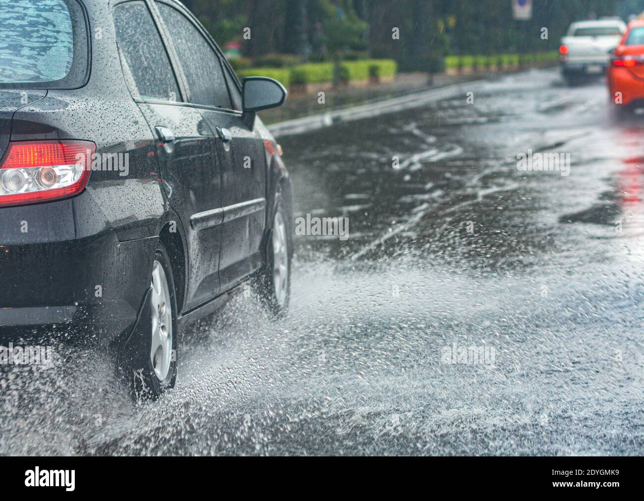Car driving through flood Stock Photo Alamy