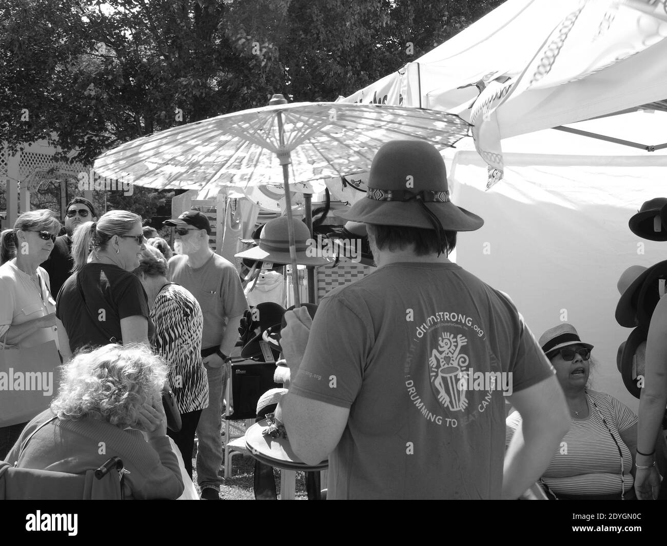 Random black and white scene of people at a craft festival. Stock Photo