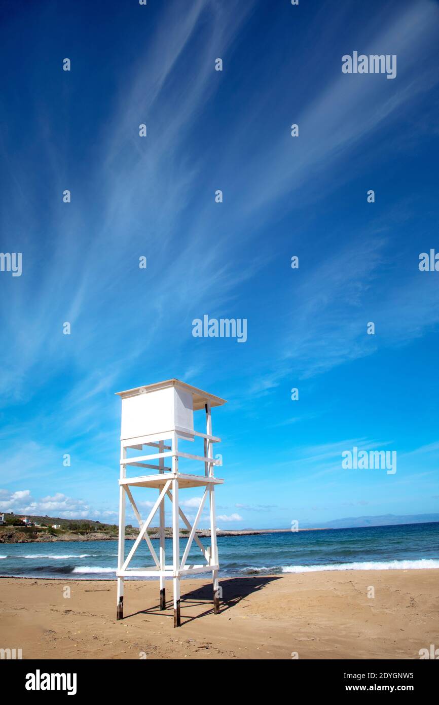 A lifeguard tower stands empty in early spring season at Kalathas beach near Chania, Crete. Stock Photo