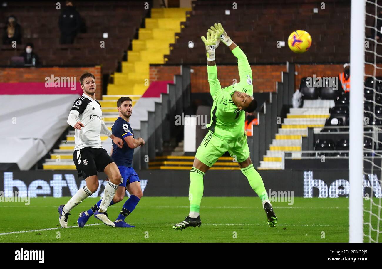 Southampton's Shane Long lobs Fulham goalkeeper Alphonse Areola but the goal is ruled out during the Premier League match at Craven Cottage, London. Stock Photo