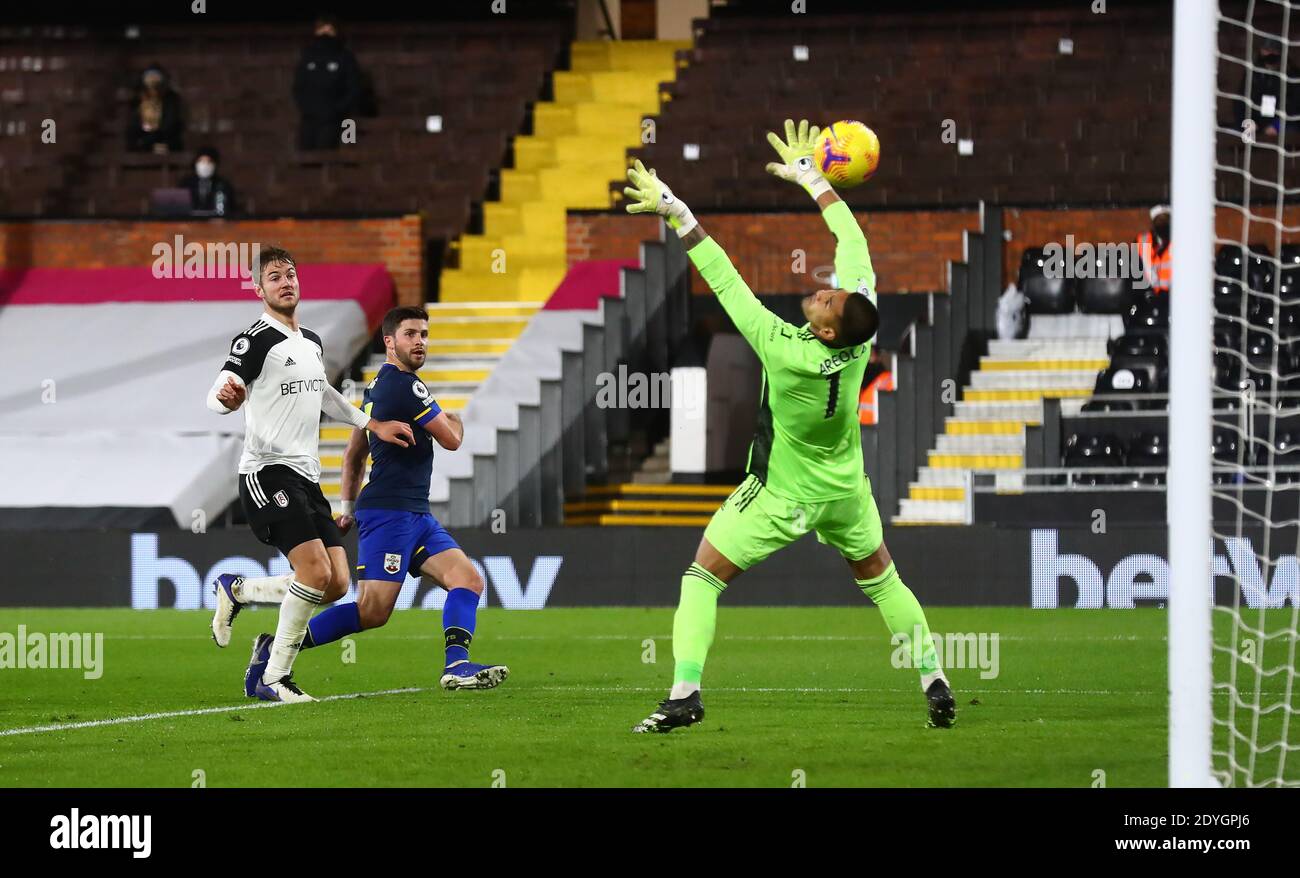 Southampton's Shane Long lobs Fulham goalkeeper Alphonse Areola but the goal is ruled out during the Premier League match at Craven Cottage, London. Stock Photo