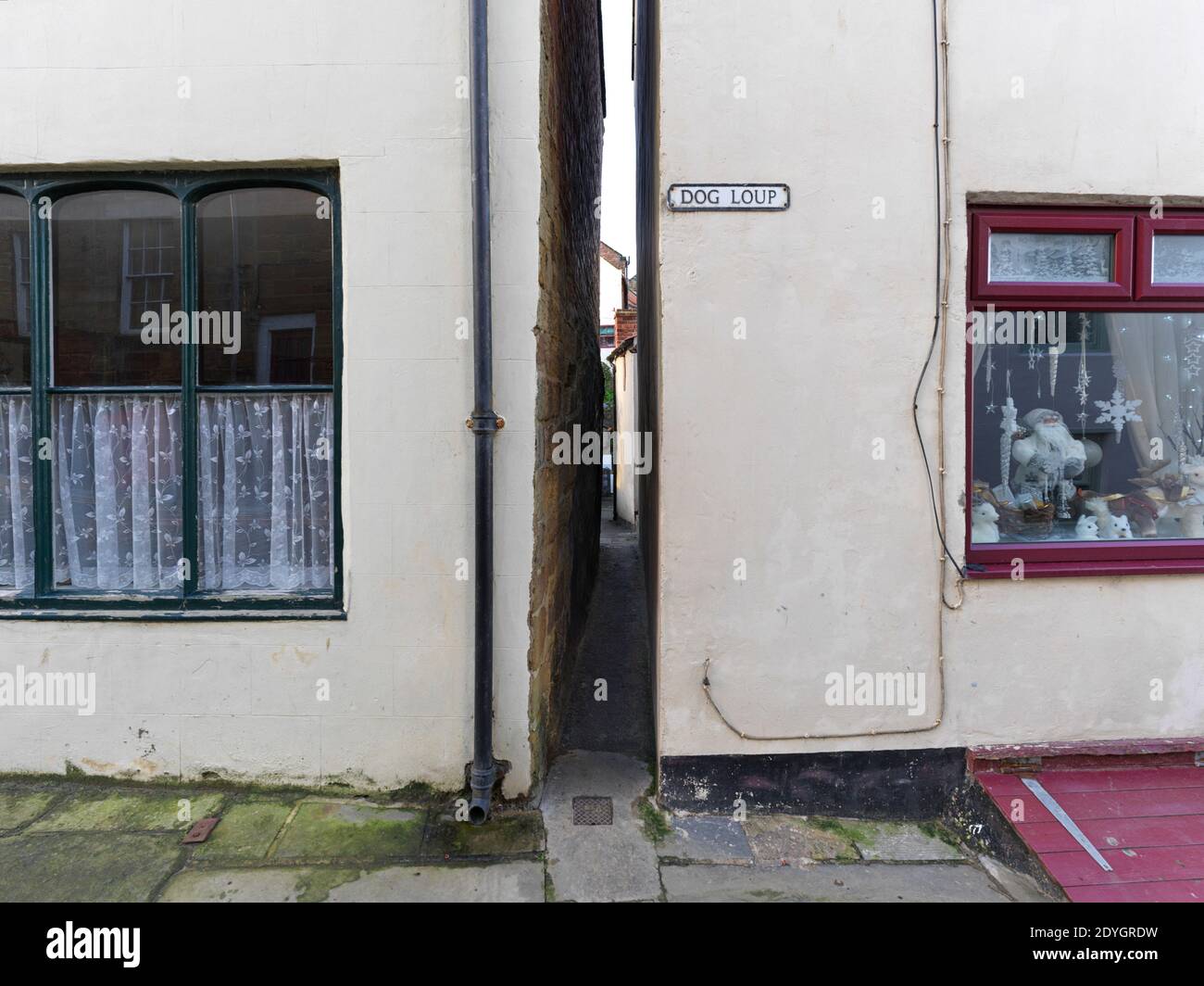 Dog Loup is claimed to be the narrowest street in Britain at only 18 inches wide, Stock Photo