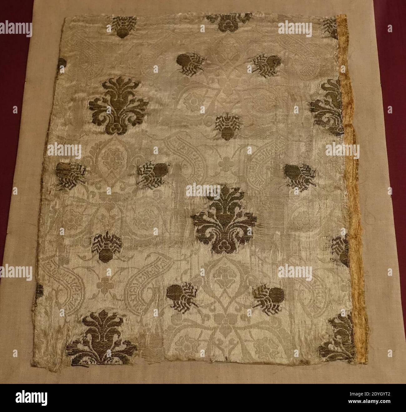 Lampas textile fragment, Spain or Italy, late 14th to early 15th century AD, silk with gold thread Stock Photo