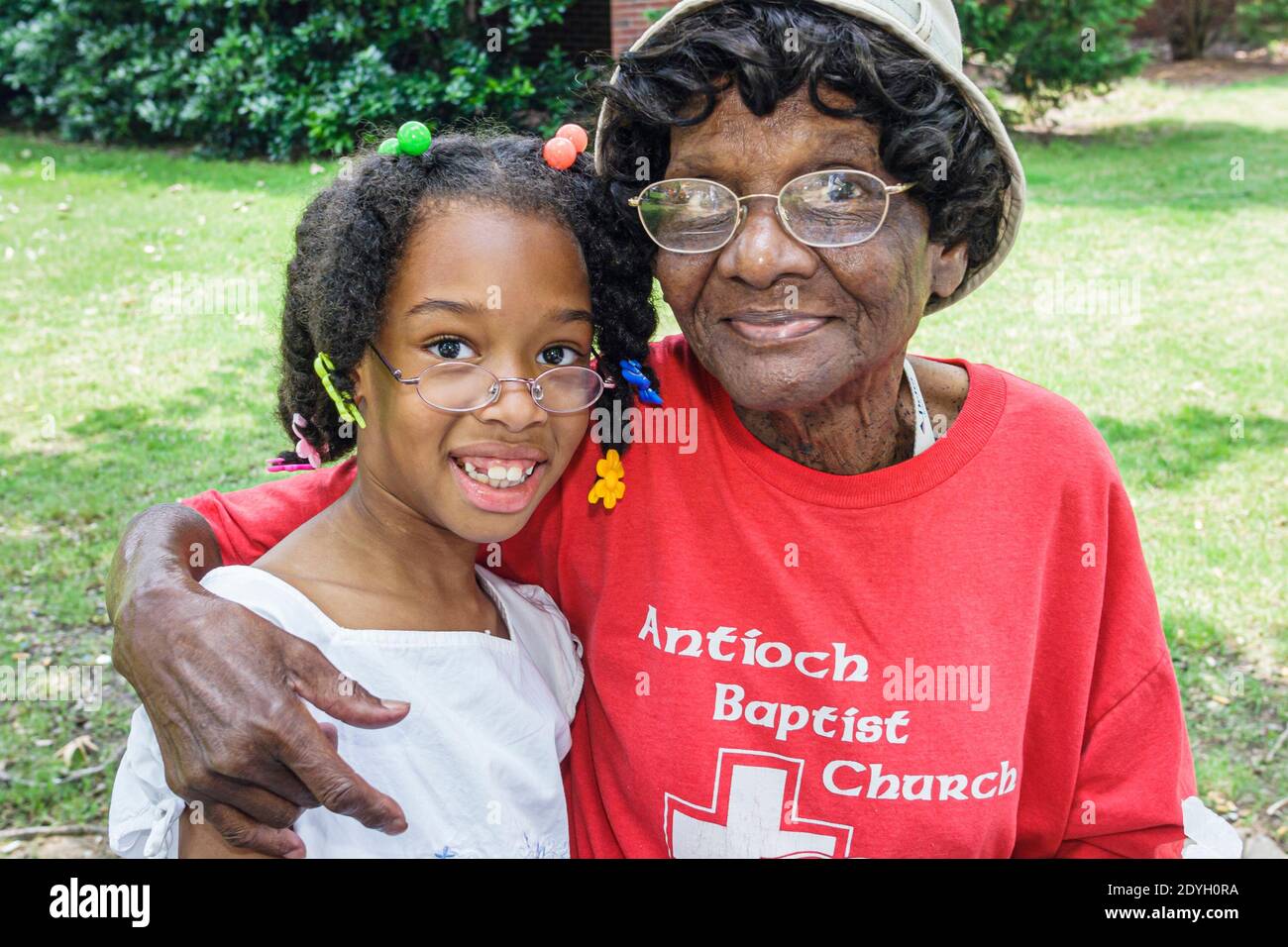 Birmingham Alabama,Juneteenth Celebration Emancipation Day Kelly Ingram Park,Black grandmother senior woman female granddaughter girl hugging family i Stock Photo