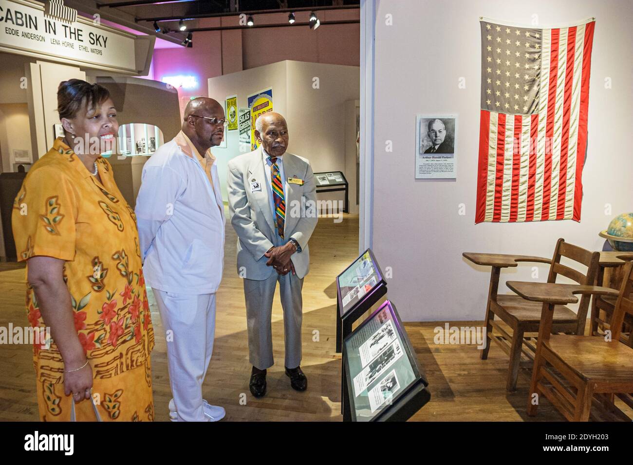 Birmingham Alabama,Civil Rights Institute Black man men woman female senior,volunteer guide exhibit exhibition collection looking segregation racism h Stock Photo