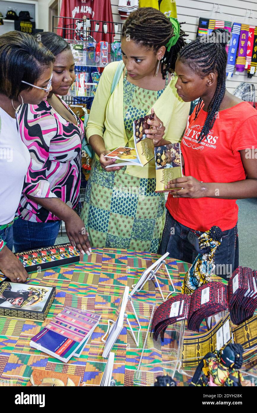 Birmingham Alabama,Civil Rights Institute Black woman female teen girls,teenage teenagers gift shop shopping shoppers inside interior, Stock Photo