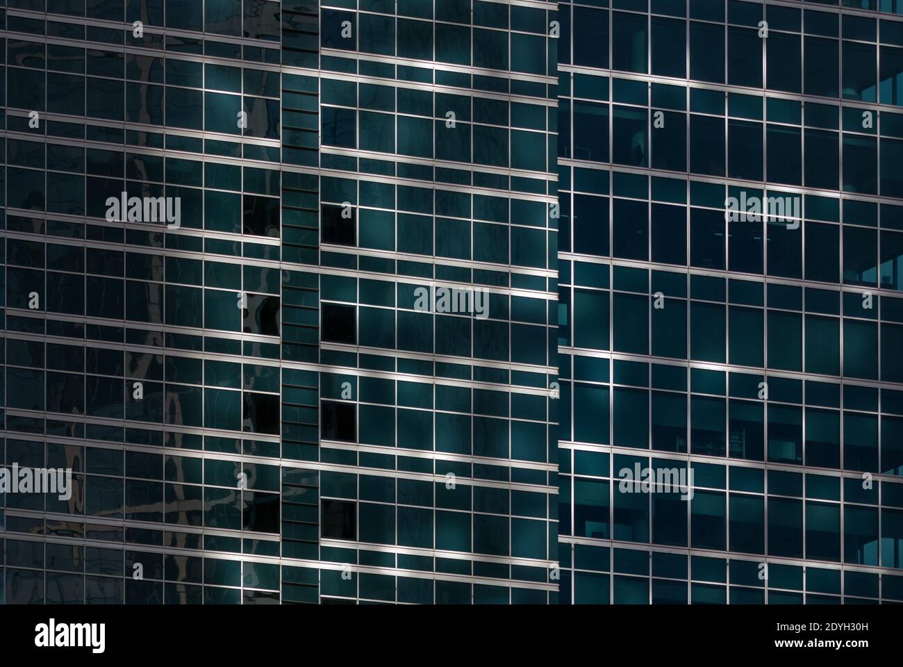 Modern architecture texture - dark blue-green building exterior of glass and steel Stock Photo