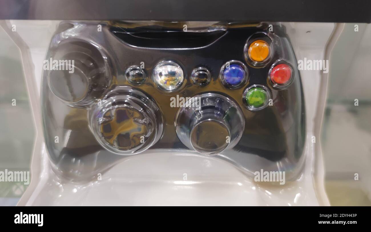 Sealed video game control. Control on sale display. Department store