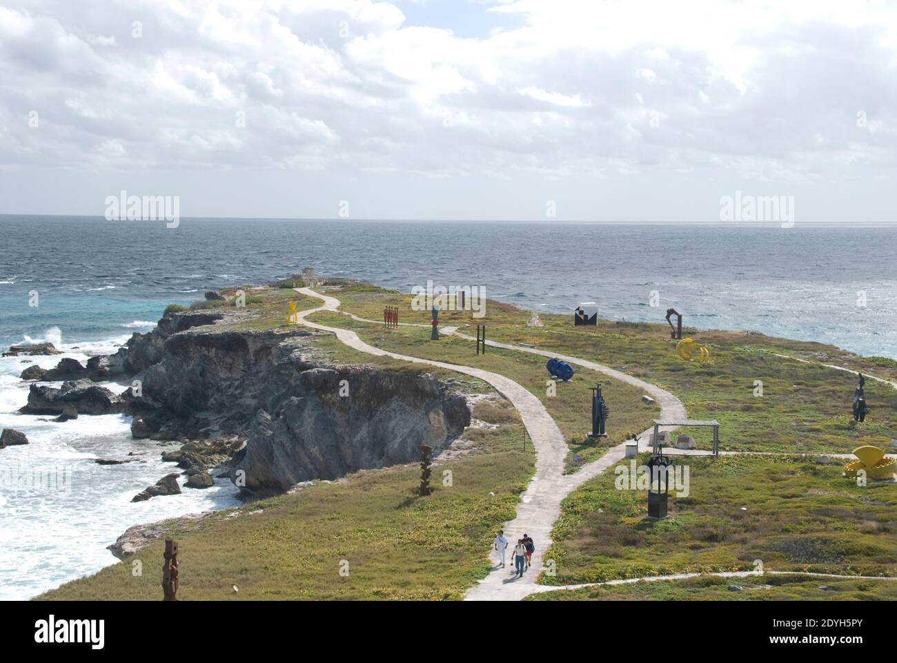 Visitors walk the trails at Punta Sur, a sculpture garden at the southern tip of Isla Mujeres, Quintana Roo, Mexico. Stock Photo