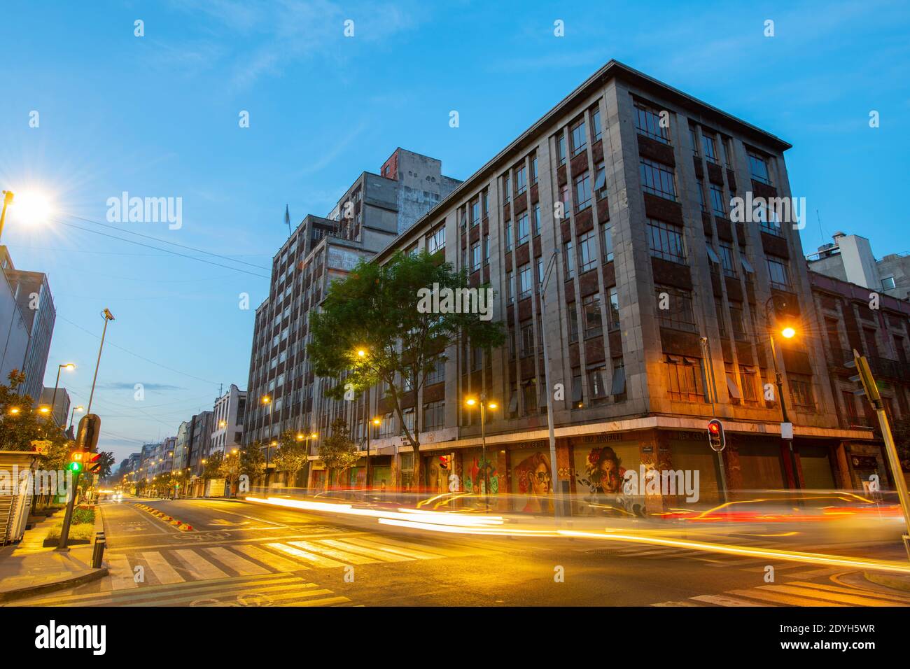 Historic buildings at night on Avenida Republica de Uruguay and Avenida 20 de Noviembre near Zocalo Constitution Square, Mexico City CDMX, Mexico. His Stock Photo