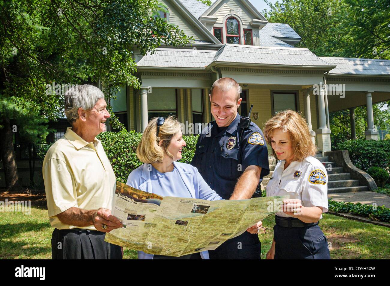 Alabama Florence Kennedy Douglass Center for the Arts,outside exterior police giving directions man woman female couple visiting visitors, Stock Photo