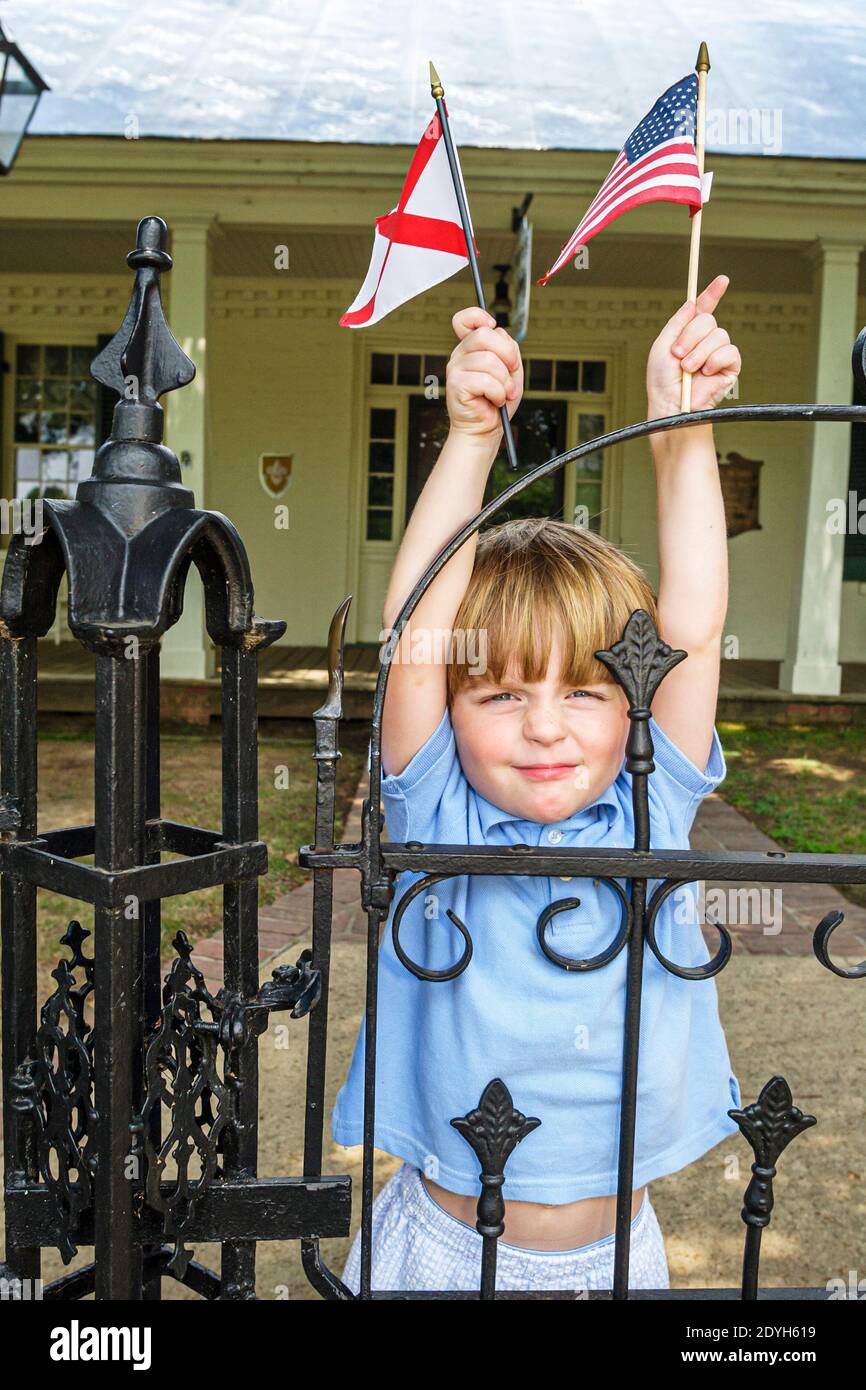 Alabama Florence Pope's Tavern Museum,local history 18th century stagecoach stop boy state US flags, Stock Photo