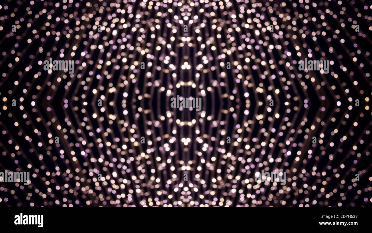 background blurred pattern luminous blue and white led dots lights on black background Stock Photo