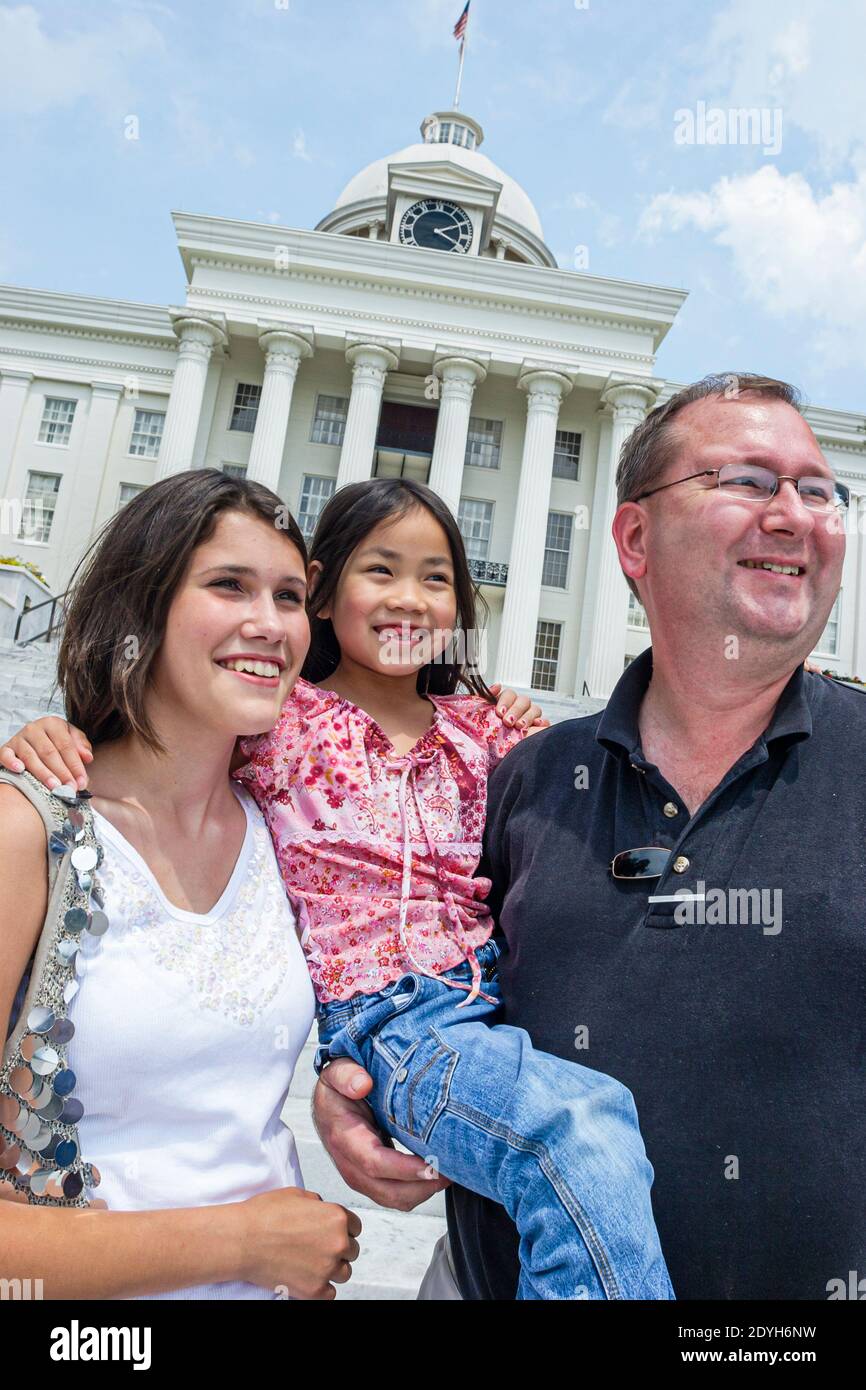 Alabama Montgomery State Capitol building,family parents child mother father Asian girl daughter, Stock Photo