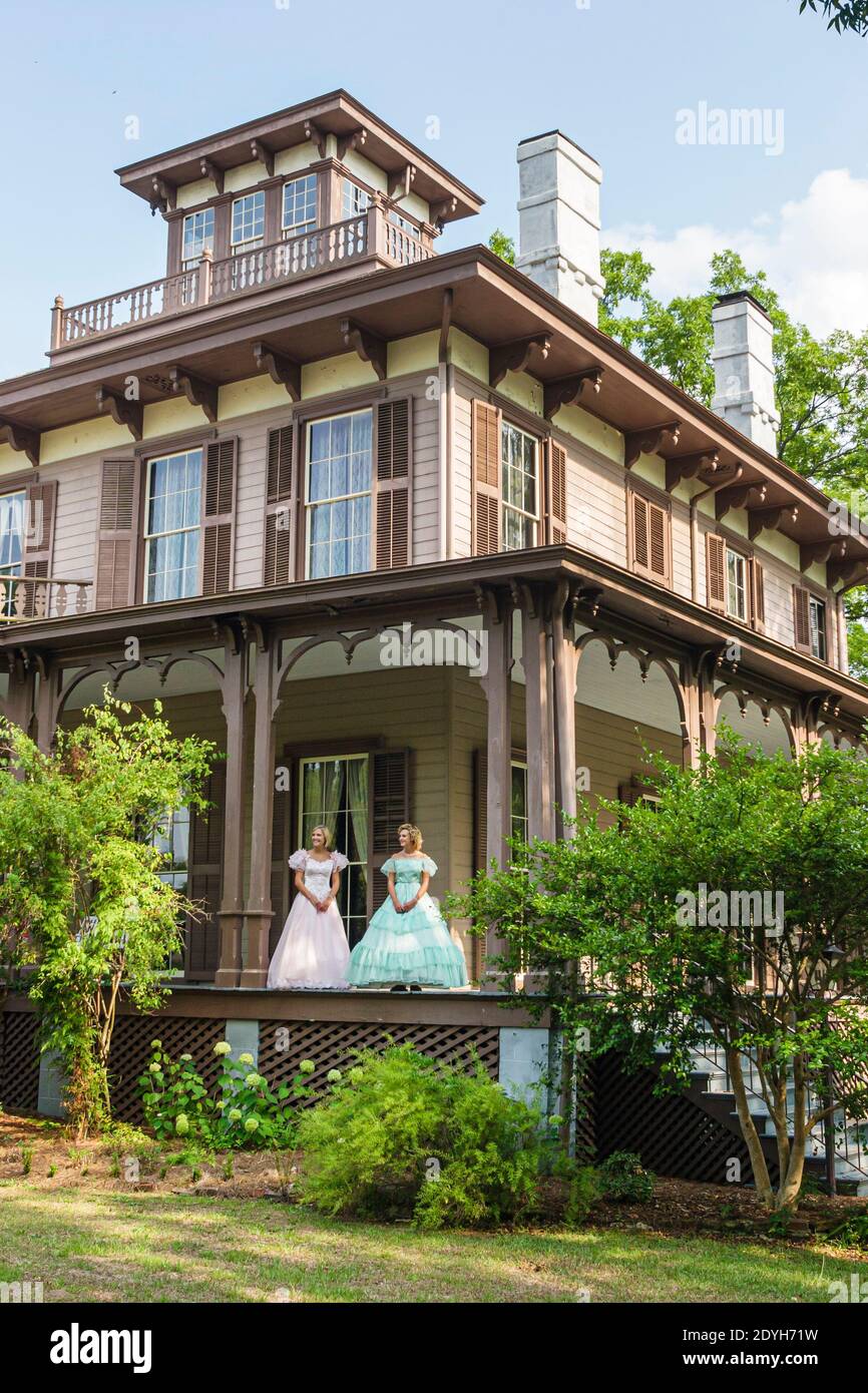 Alabama Eufaula Fendall Hall Young–Dent Home,Italianate-style historic house museum 1860,guides belles women period dresses front entrance exterior ou Stock Photo
