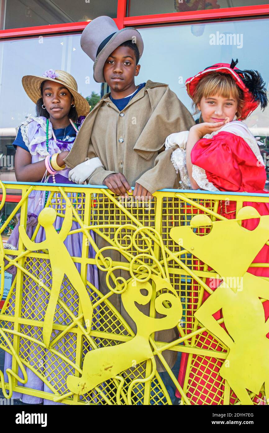 Tuscaloosa Alabama,Children's Hands On Museum,Black teen teenage teenager girls boy,student students wearing costumes Victorian dress clothing, Stock Photo