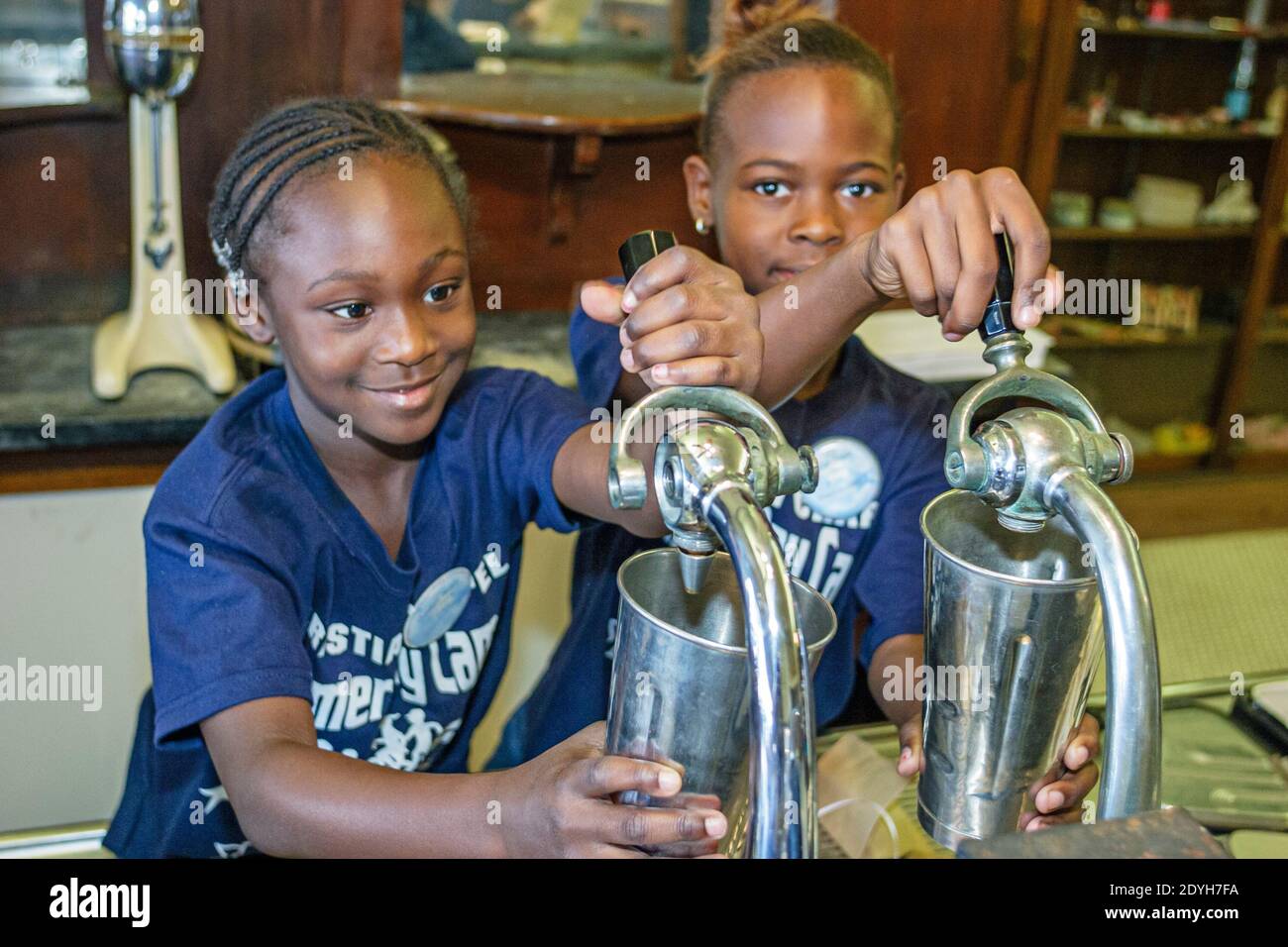 Tuscaloosa Alabama,Children's Hands On Museum,Black girls student students soda fountain, Stock Photo