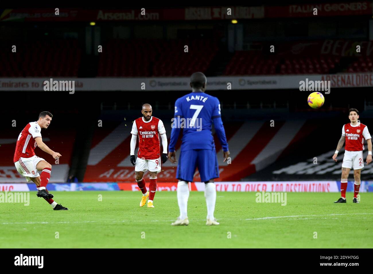 Arsenal's Granit Xhaka (left) scores his side's second goal of the game