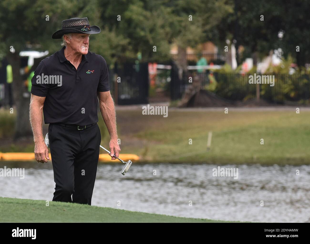 December 20, 2020 - Orlando, Florida, United States - Australian Greg Norman approaches the 18th green during the final round at the PNC Championship golf tournament at the Ritz-Carlton Golf Club on December 20, 2020 in Orlando, Florida. On Christmas Day, Norman posted a photo to Instagram from a hospital bed where he was being treated for COVID-19 symptoms. NormanÕs son, Greg Norman Jr., who played with his father at the tournament, also posted a photo to Instagram, stating that he and his fiancee have tested positive for the COVID-19 virus. (Paul Hennessy/Alamy) Stock Photo