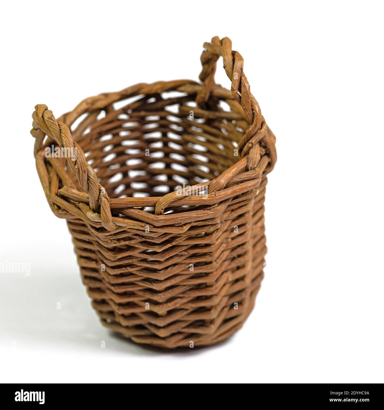 Handle basket isolated against a white background Stock Photo - Alamy