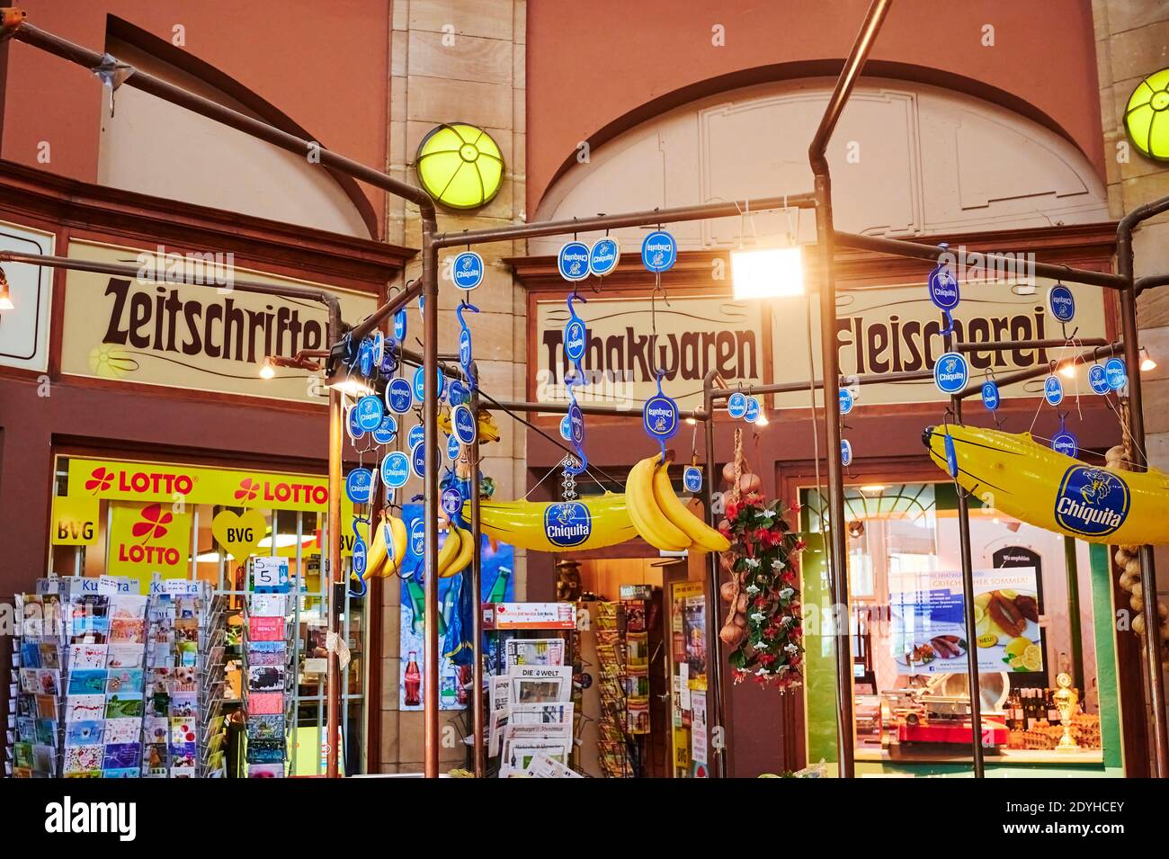 Berlin, Germany - May 13, 2020: A market stall with bananas and other stores in the background. Stock Photo