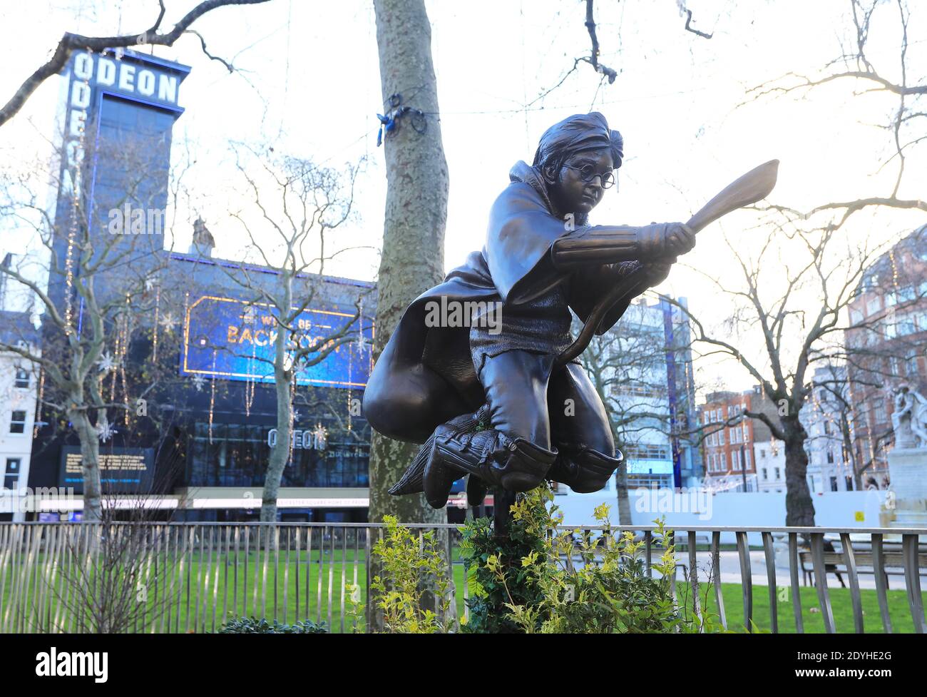 The latest film character themed statue in Leicester Square - Harry Potter, showing a scene from The Philosopher's Stone, showing the young wizard playing Quidditch, in London, UK Stock Photo