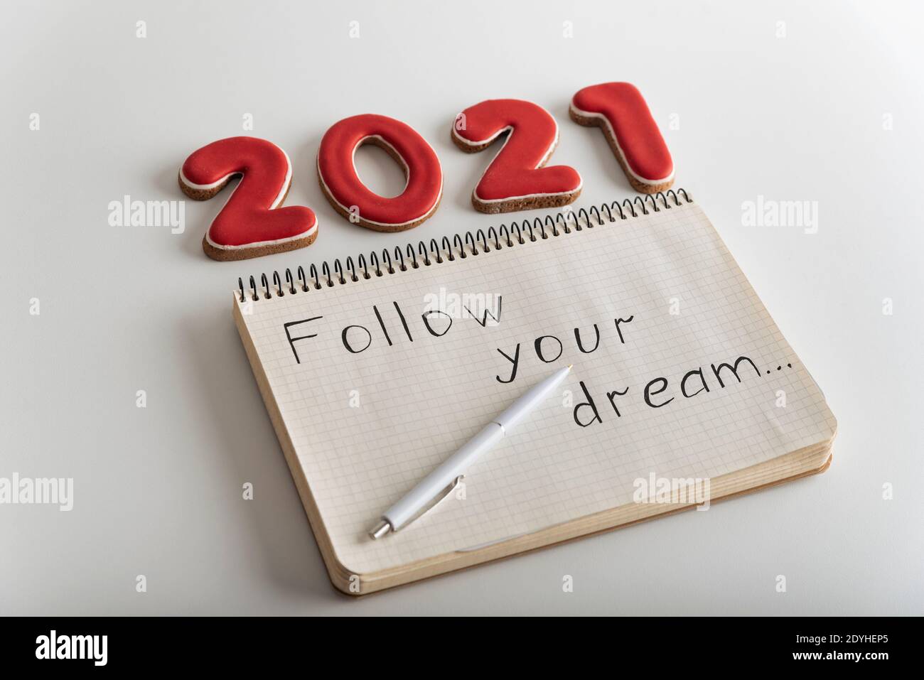 Numbers 2021 and notebook with the words Follow your dream. Motivation for  2021 Stock Photo - Alamy