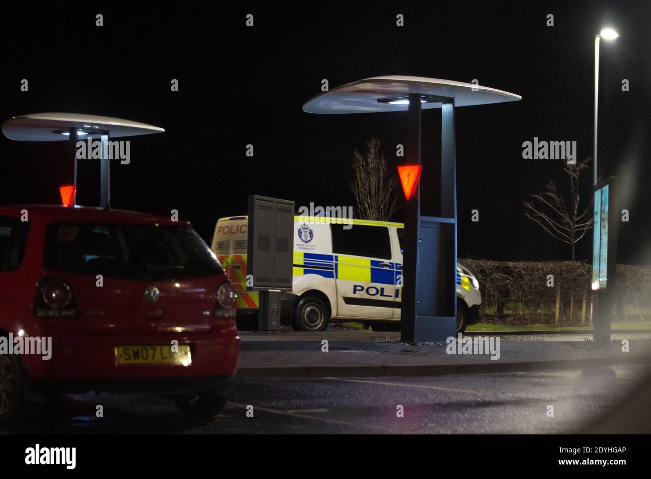 Dunbar, Scotland, UK. 26th Dec, 2020. Pictured: After being on the road for 5 hours plus including being at the Scottish/English border for 2 hours this is the first police car/van that I have seen, at McDonalds Drive Thru, after driving back up to Dunbar from the border. Credit: Colin Fisher/Alamy Live News Stock Photo