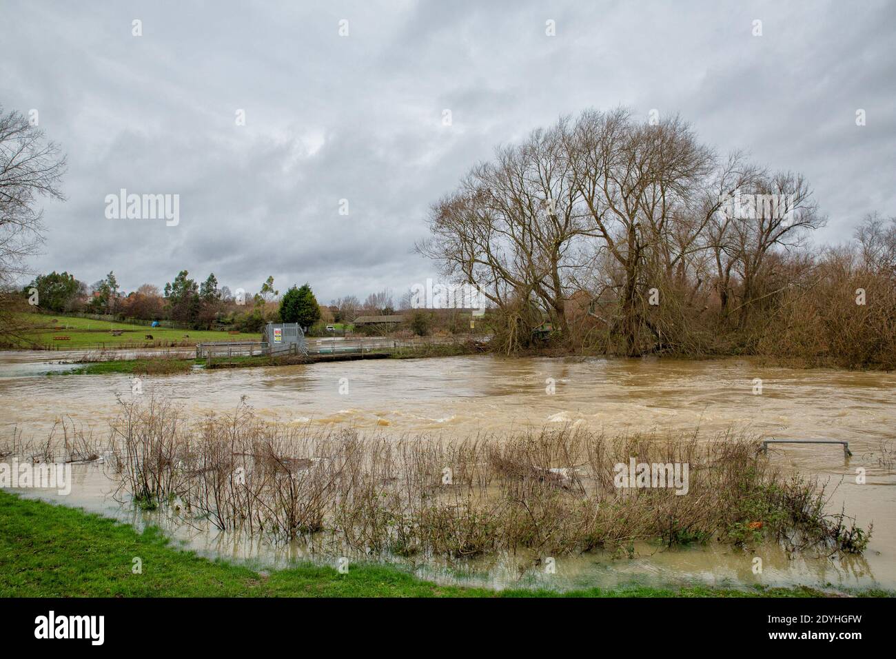 Fields around the town are flooded with water.The River Nene at ...
