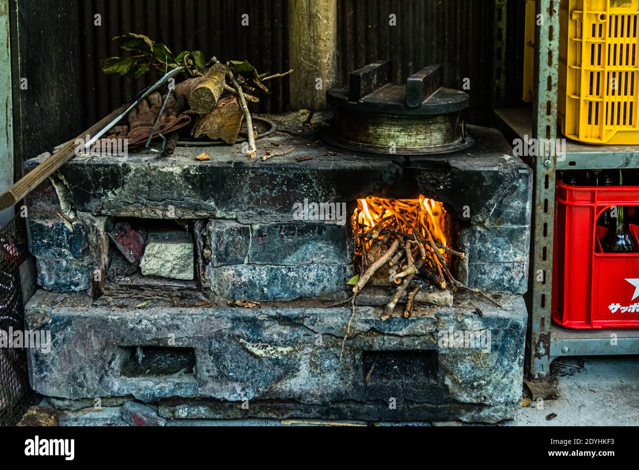 Traditional Japanes Rice Cooking over open Fire by Atsuko Kato Stock Photo