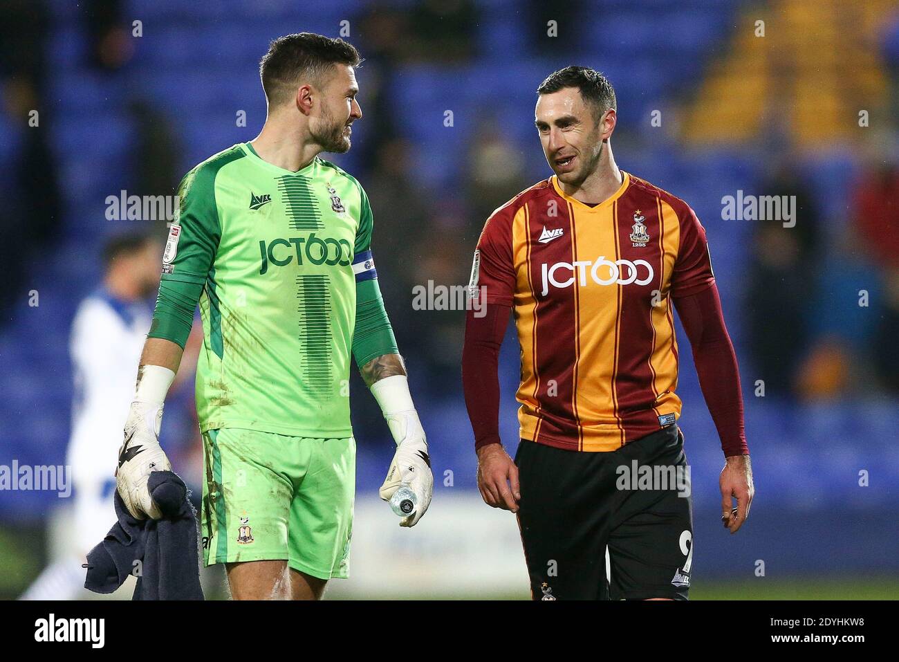 Bradford City Goalkeeper Richard O'Donnell (l) and goal scorer Lee Novak of Bradford City leave the pitch at the end of the game. EFL Skybet Football league two match, Tranmere Rovers v Bradford City at Prenton Park, Birkenhead, Wirral on Boxing Day, Saturday 26th December 2020. this image may only be used for Editorial purposes. Editorial use only, license required for commercial use. No use in betting, games or a single club/league/player publications.pic by Chris Stading/Andrew Orchard sports photography/Alamy Live News Stock Photo