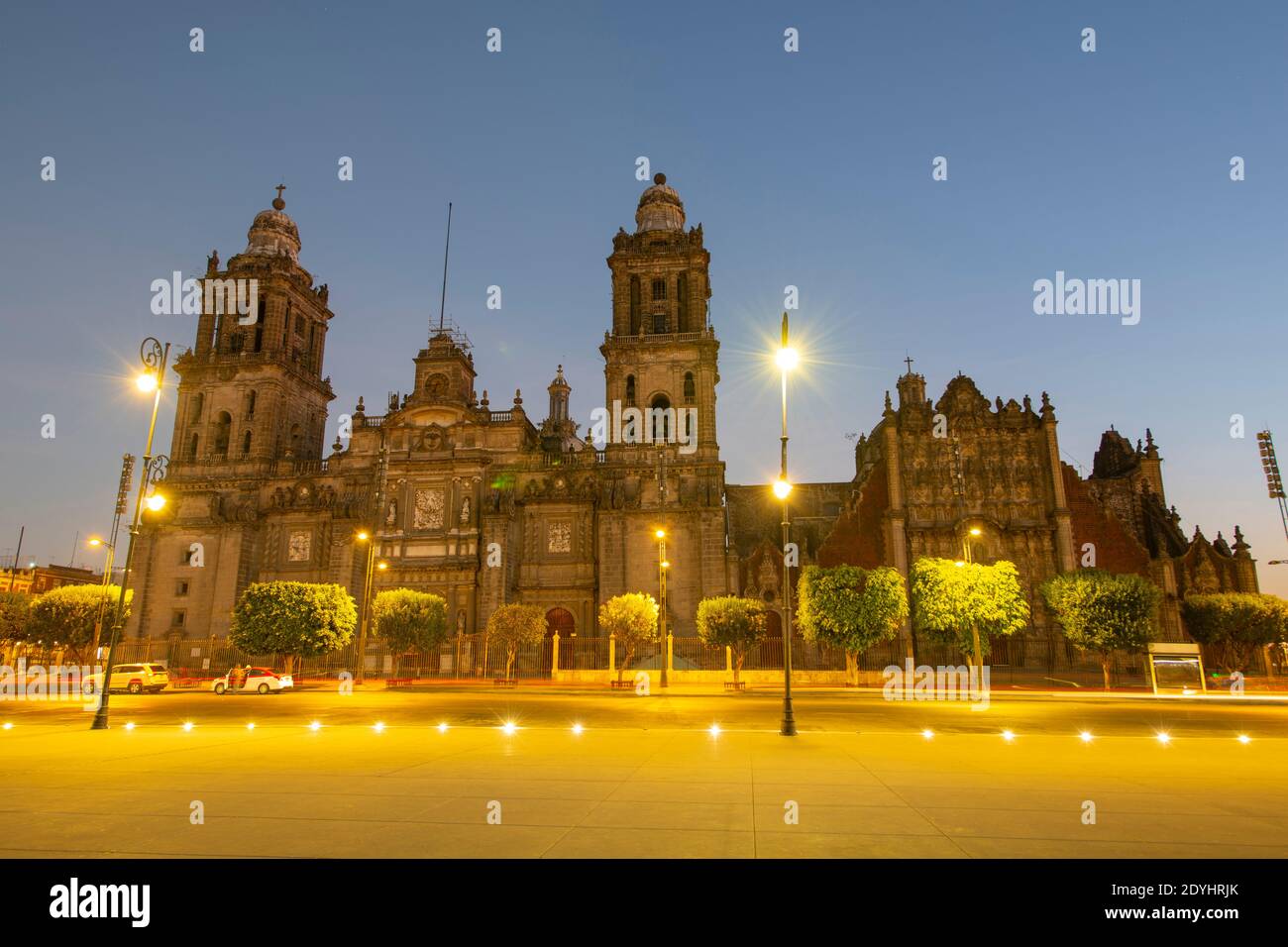 Zocalo Constitution Square and Metropolitan Cathedral at sunrise twilight, Mexico City CDMX, Mexico. Historic center of Mexico City is a UNESCO World Stock Photo