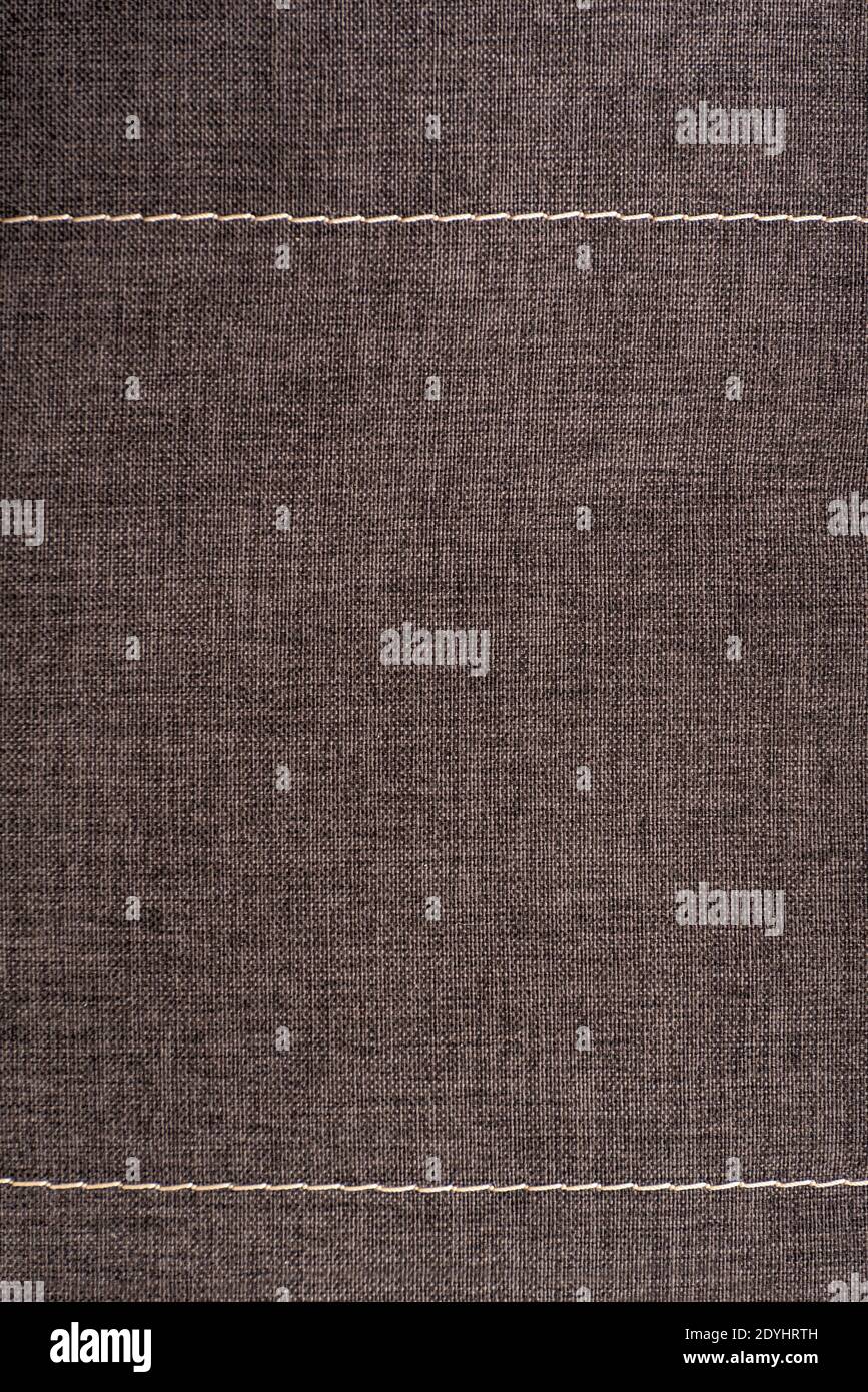 Textile surface. Gray fabric background. Vertical frame. Stock Photo