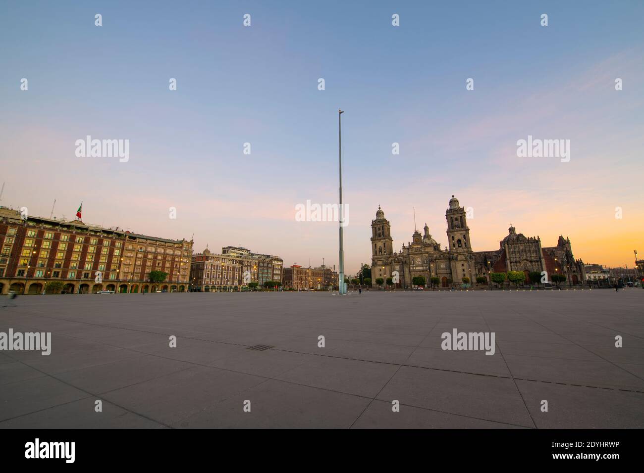 Zocalo Constitution Square and Metropolitan Cathedral at sunrise twilight, Mexico City CDMX, Mexico. Historic center of Mexico City is a UNESCO World Stock Photo