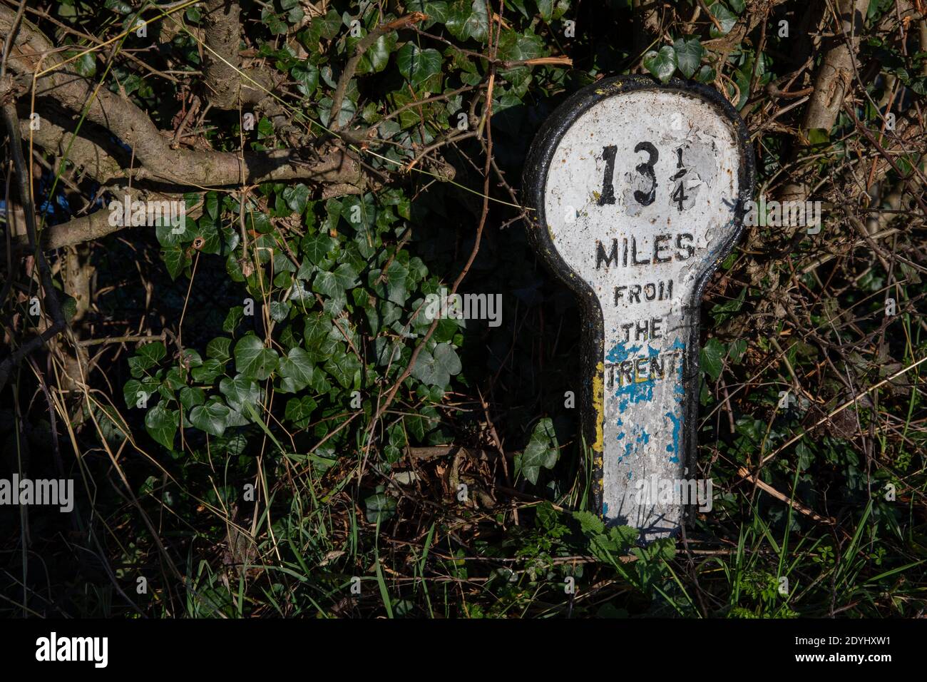Mile post (13 1/4 miles from the Trent) along Grantham Canal near Hickling, Nottinghamshire, England, United Kingdom Stock Photo