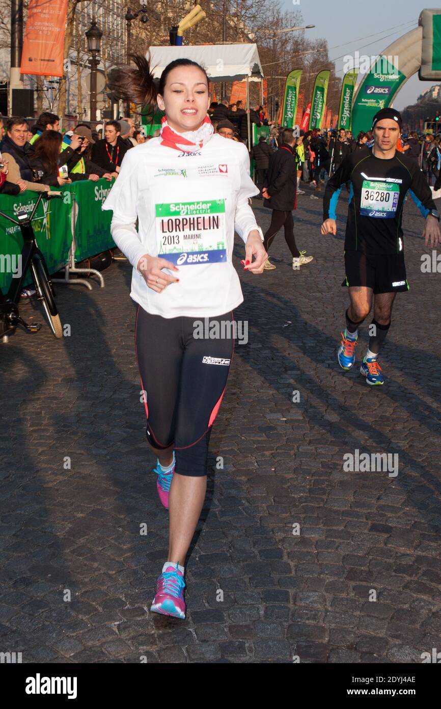 Miss france 2013 Marine Lorphelin at the Departure on The Champs Elysees of  the 37th Marathon of Paris 2013 on April 07, 2013 in Paris, France. Marathon  starting the race along the