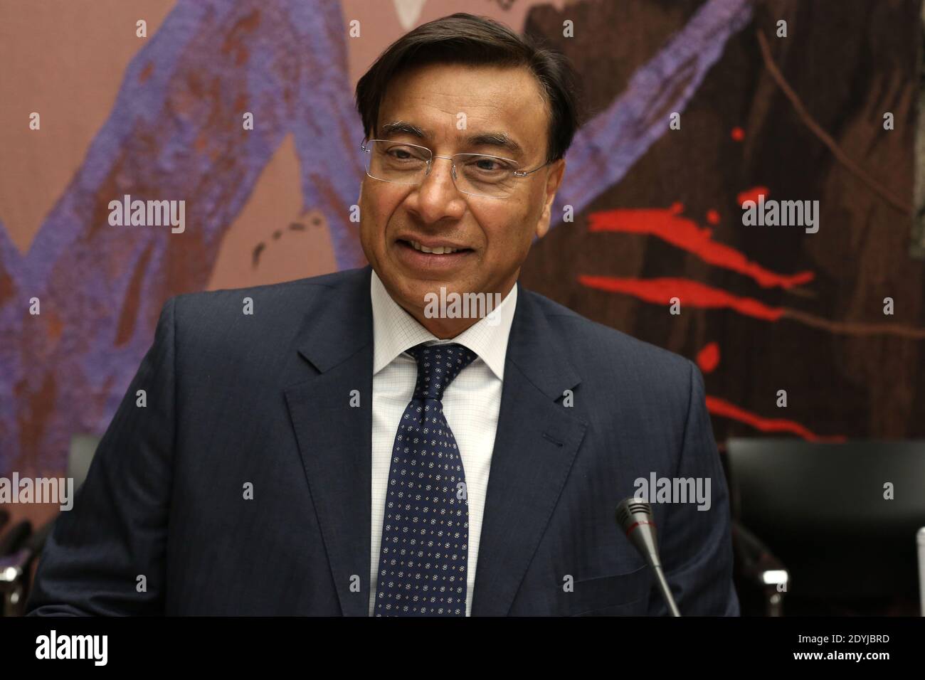 Steel giant group ArcelorMittal's president Lakshmi Mittal is pictured at the start of a 'Commission of inquiry into the state of the French and European iron and steel industry and the conditions of its safety and development', at National Assembly in Paris, France on April 17, 2013 flanked by ArcelorMittal Executive vice president Henri Blaffart (L) and Commission president Jean Grellier (R). ArcelorMittal has found itself embroiled in controversy in France over the closure of blast furnaces at Florange. In Luxembourg it has temporarily closed a blast furnace at Schifflange and cut productio Stock Photo