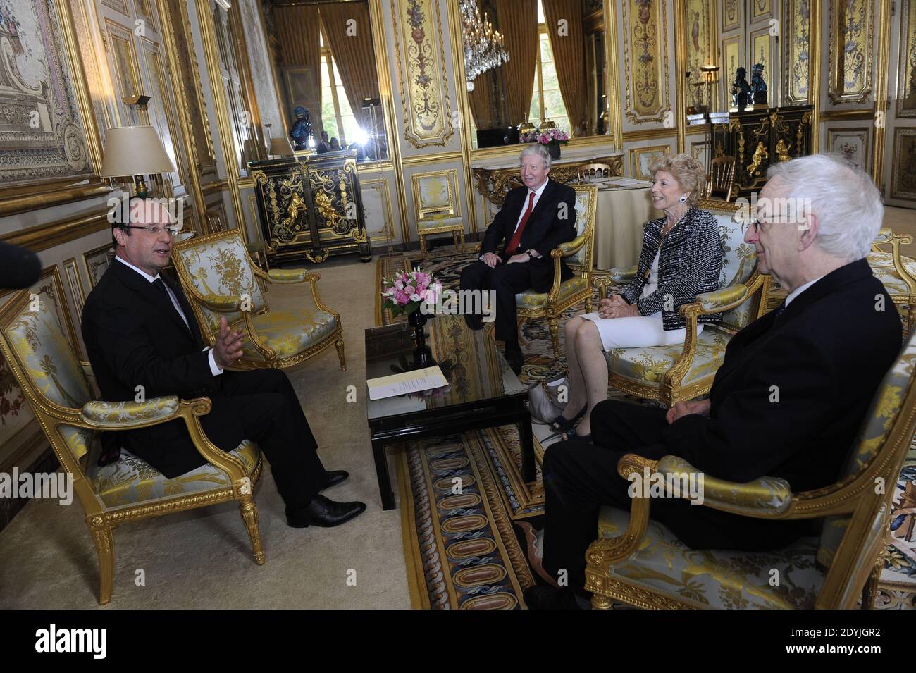 French president Francois Hollande (L) receives the permanent secretary of the Academie Française, Helene Carrere d'Encausse (2nd R), newly-elected member of the Academie Francaise, British poet and academic Michael Edwards (R) and President of the French Academy of Sciences, Luxembourg-born French biologist Jules Hoffmann (3rdR), at the Elysee Palace in Paris, France on April 22, 2013. Photo by Mousse/ABACAPRESS.COM Stock Photo