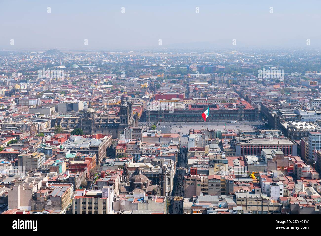 Mexico National Flag on Zocalo Constitution Square and Metropolitan Cathedral aerial view, from Torre Latinoamericana, Mexico City, Mexico. Historic c Stock Photo