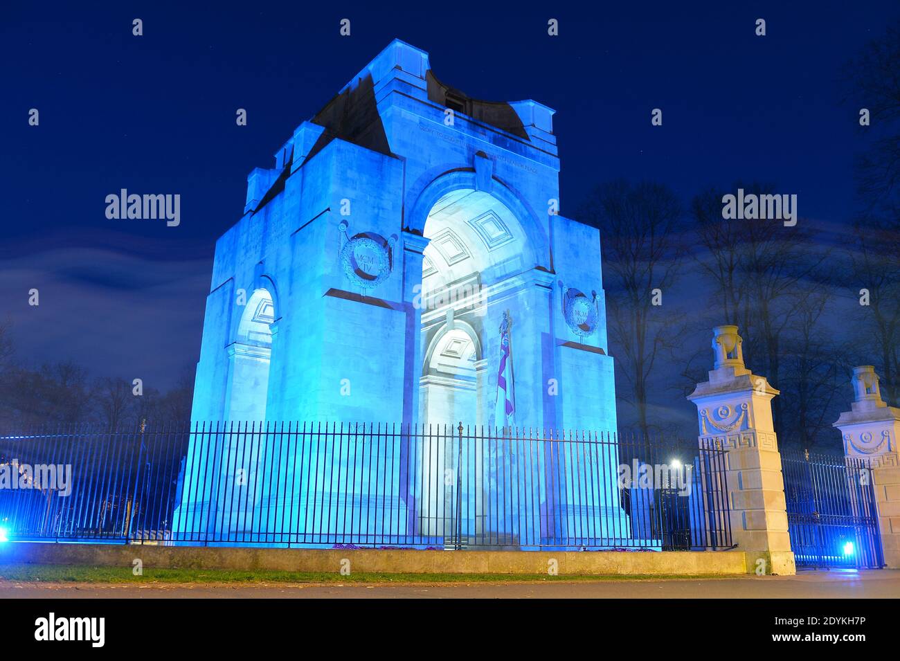 The War Memorial in Victoria Park in Leicester is illuminated with blue light to pay tribute to the NHS workers during the Coronavirus Pandemic Stock Photo