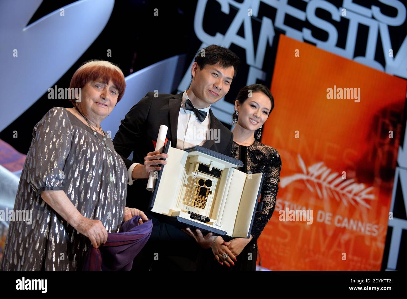 Singaporean director Anthony Chen (C) poses on stage with director Agnes Varda and Chinese actress and member of the Un Certain Regard Jury Zhang Ziyi at the Inside closing ceremony during the 66th Annual Cannes Film Festival at the Palais des Festivals in Cannes, France on May 26, 2013. Photo by Lionel Hahn/ABACAPRESS.COM Stock Photo